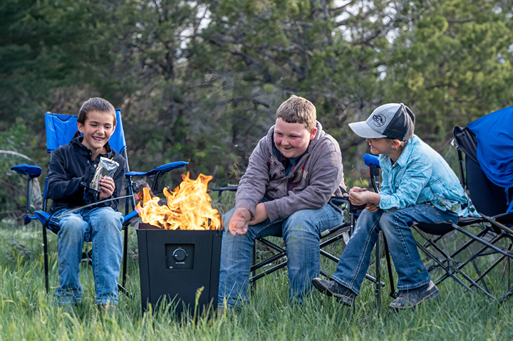 Gathering Around An Outdoor Fire Pit by Live Outdoor
